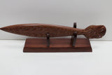 Wooden Paddle with a Stand