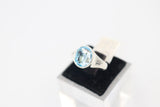 Stg Silver Blue Topaz Ring with Dolphin Etching